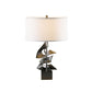A unique design Gallery Two Fold Table Lamp with a metal base and a white shade, handmade by Hubbardton Forge.