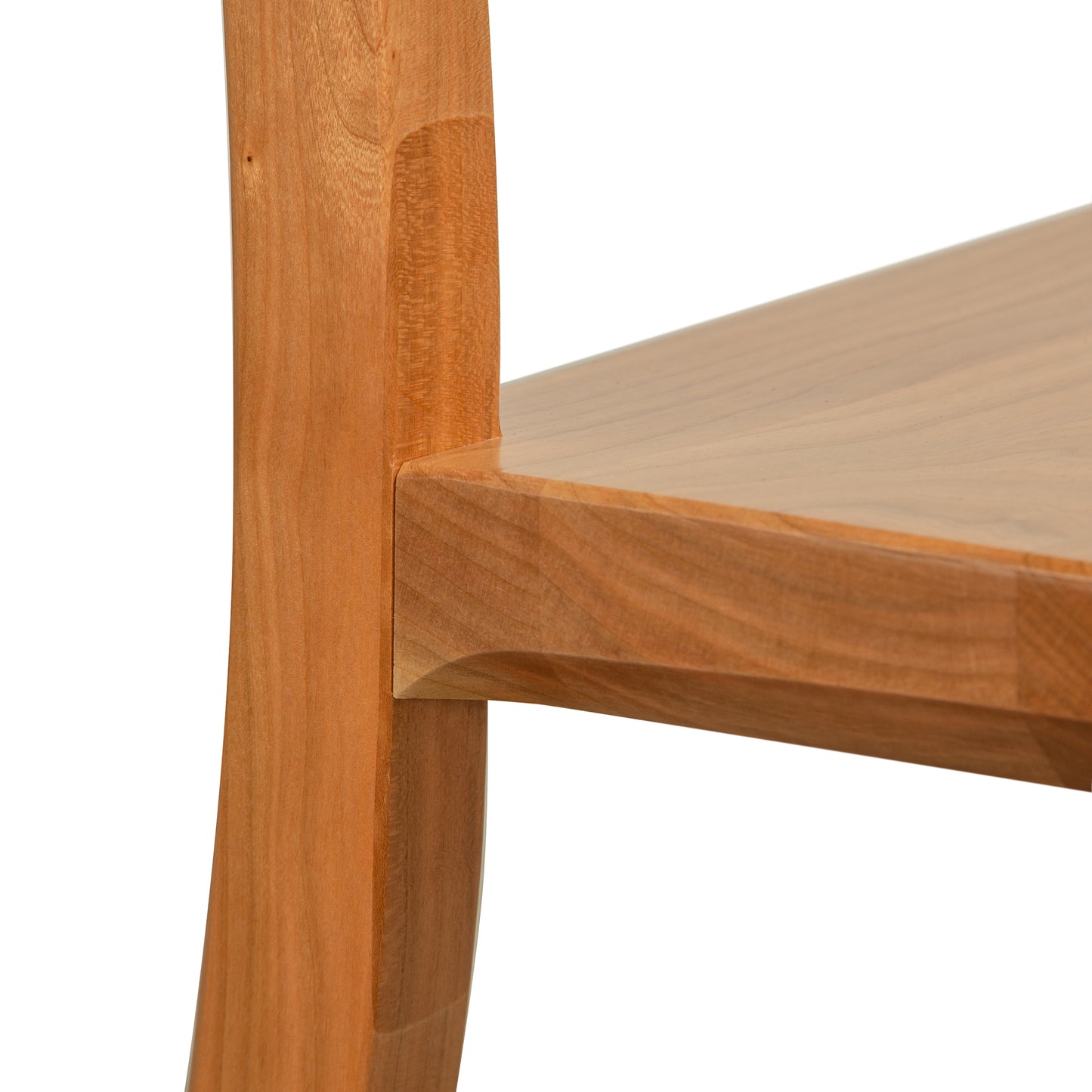 Close-up of the Grafton Chair by Vermont Woods Studios, highlighting polished cherry wood grain and craftsmanship.