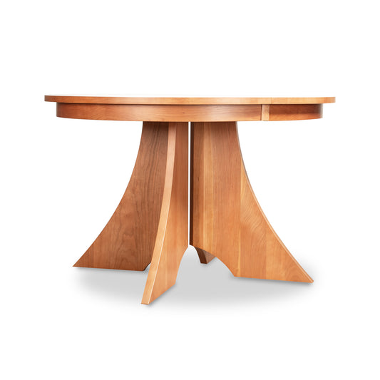 Hampton Split Pedestal Extension Table by Lyndon Furniture, crafted in solid wood with a smooth top and elegant four curved legs, American made.