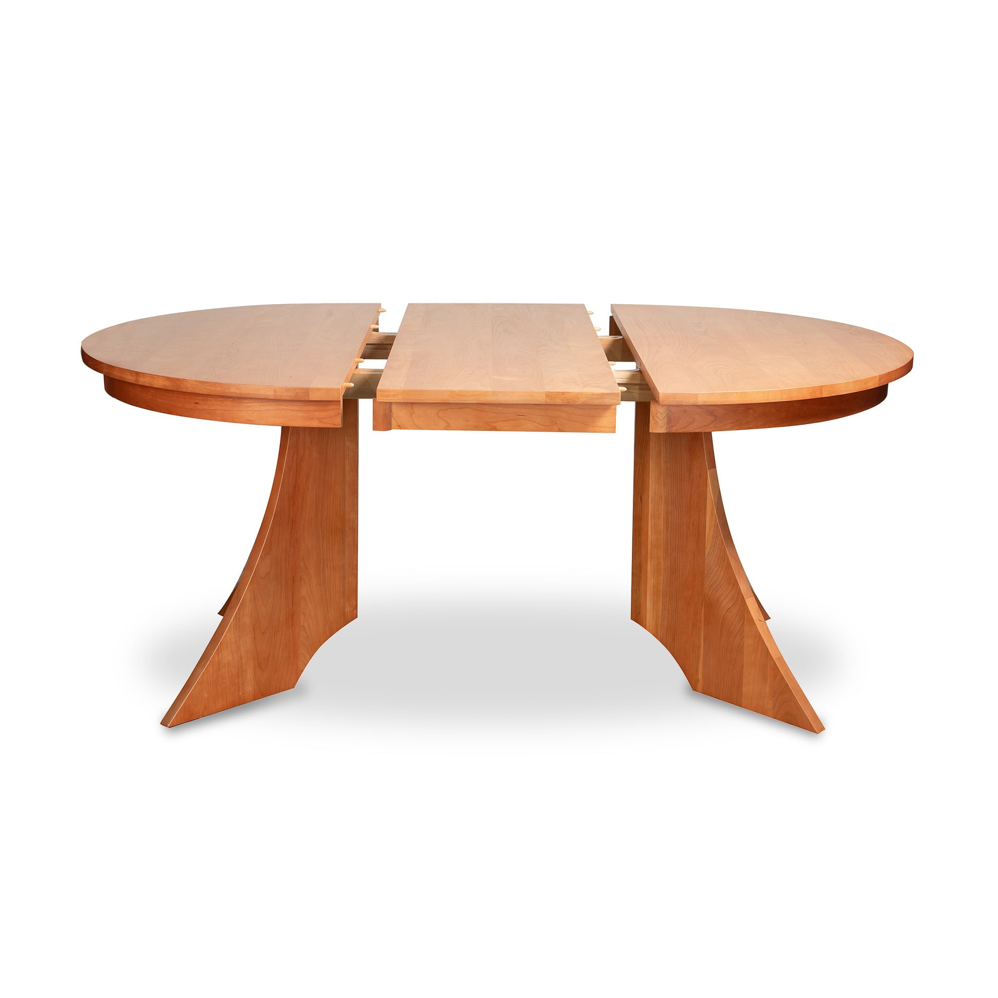 Hampton Split Pedestal Extension Table by Lyndon Furniture, solid wood with a central leaf and curved legs, partially open to show extension feature.