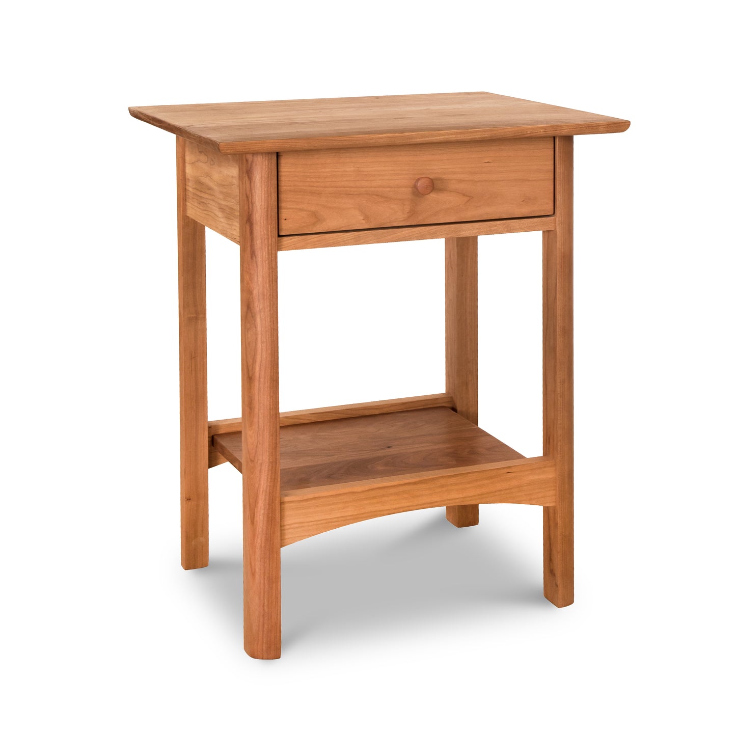 A solid wood bedside table with a shelf on top, the Vermont Furniture Designs Heartwood Shaker 1-Drawer Open Shelf Nightstand.