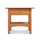 Heartwood Shaker Nightstand by Vermont Furniture Designs featuring elegant wooden craftsmanship with a drawer and shelf.