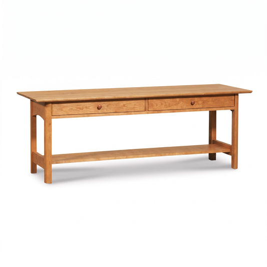 Heartwood Shaker 2-Drawer Coffee Table by Vermont Furniture Designs, solid wood with lower shelf, features elegant craftsmanship and classic style.
