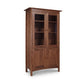 Heartwood Shaker 4-Door Bookcase by Vermont Furniture Designs features glass and solid doors, crafted on four legs in a classic American-made style.
