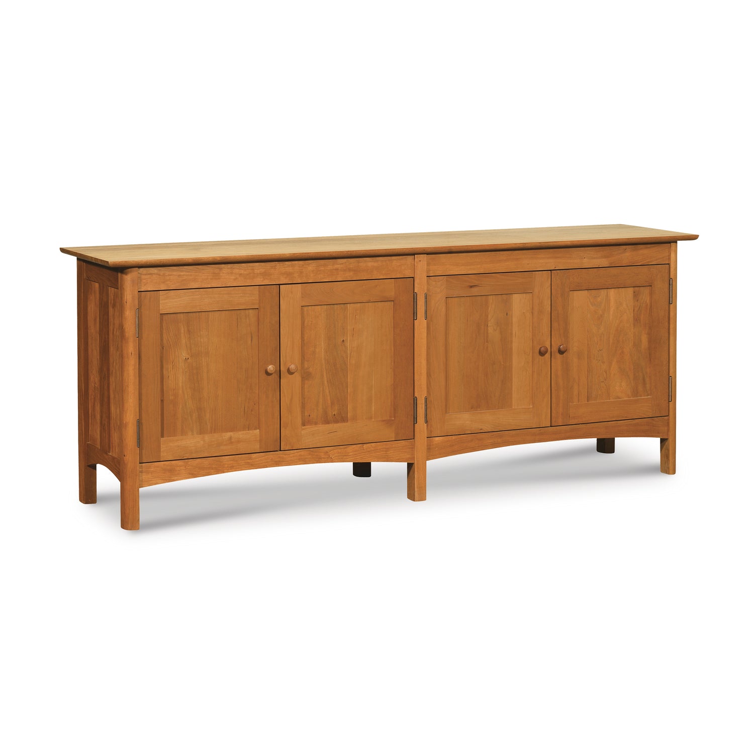 Heartwood Shaker 4-Door Console Bookcase by Vermont Furniture Designs, long wooden sideboard with four closed cabinet doors and simple handles, highlighting the elegance of handcrafted solid wood furniture.