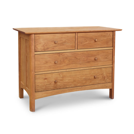 A luxury Heartwood Shaker 4-Drawer Dresser made by Vermont Furniture Designs on a white background.