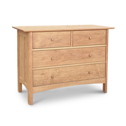 Heartwood Shaker 4-Drawer Dresser by Vermont Furniture Designs, featuring a natural wood finish and round knobs; handcrafted solid wood dresser with two smaller top drawers and two larger bottom drawers.