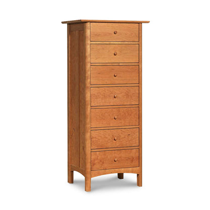 A tall wooden Heartwood Shaker 7-Drawer Lingerie Chest by Vermont Furniture Designs on a white background.