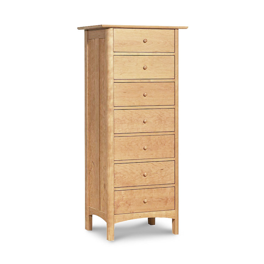 A tall, narrow Heartwood Shaker 7-Drawer Lingerie Chest from Vermont Furniture Designs, isolated on a white background.