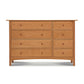 Heartwood Shaker 8-Drawer Dresser by Vermont Furniture Designs with round knobs and oil finish, showcasing classic American craftsmanship.
