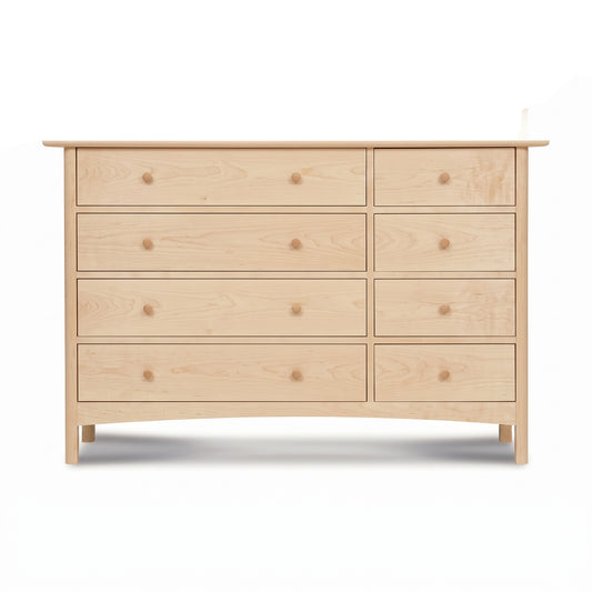 Heartwood Shaker 8-Drawer Dresser by Vermont Furniture Designs, crafted from solid hardwood with a light finish and round wooden knobs.