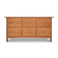 A Heartwood Shaker 6-Drawer Legal File Cabinet by Vermont Furniture Designs, featuring a simple design with a slightly curved bottom edge, isolated on a white background.