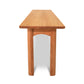 A Heartwood Shaker Bench by Vermont Furniture Designs isolated against a white background, viewed from the front.