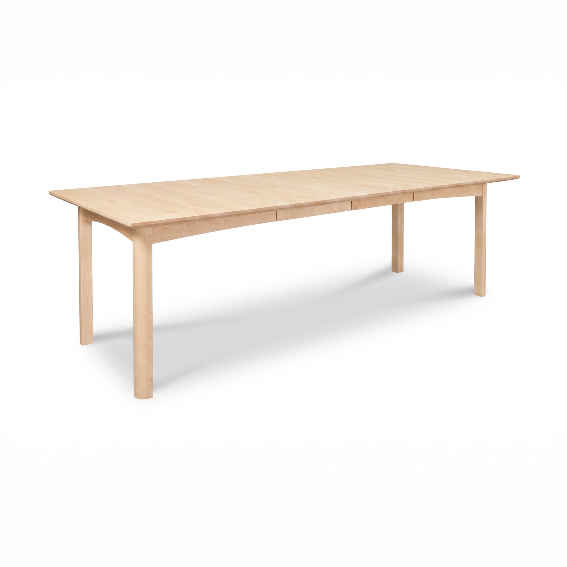 Heartwood Shaker Extension Dining Table by Vermont Furniture Designs, handcrafted from solid wood with a classic rectangular shape, American made.