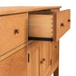A solid hardwood Heartwood Shaker File Credenza with an open drawer showcasing dovetail joints, against a white background. Brand: Vermont Furniture Designs