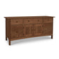 A Heartwood Shaker File Credenza from Vermont Furniture Designs with three drawers and two cabinets in Shaker style, featuring an eco-friendly oil finish on a white background.