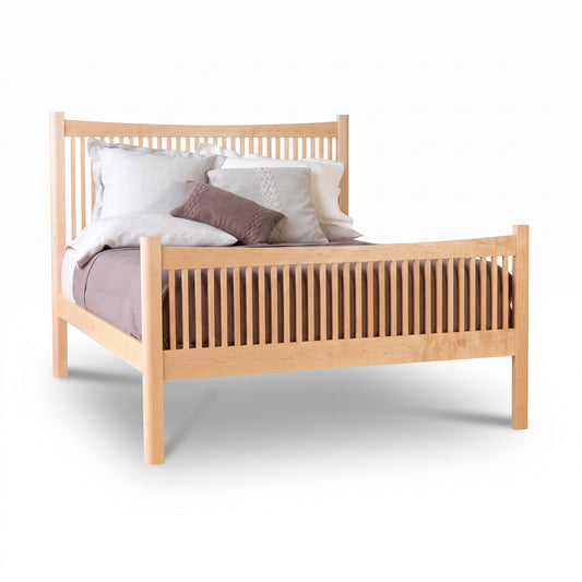 Heartwood Shaker High Footboard Bed by Vermont Furniture Designs in solid wood with vertical slats and a lavender duvet.