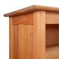 Detail view of Heartwood Shaker Open Console Bookcase by Vermont Furniture Designs, showcasing American craftsmanship and rich wood grain.