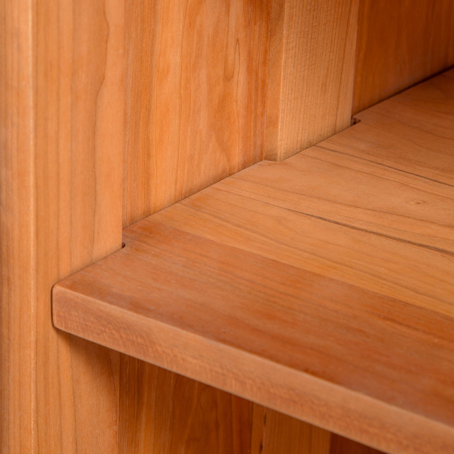 Heartwood Shaker Open Console Bookcase by Vermont Furniture Designs, highlighting the handcrafted corner, natural wood grain, and flawless smooth finish.