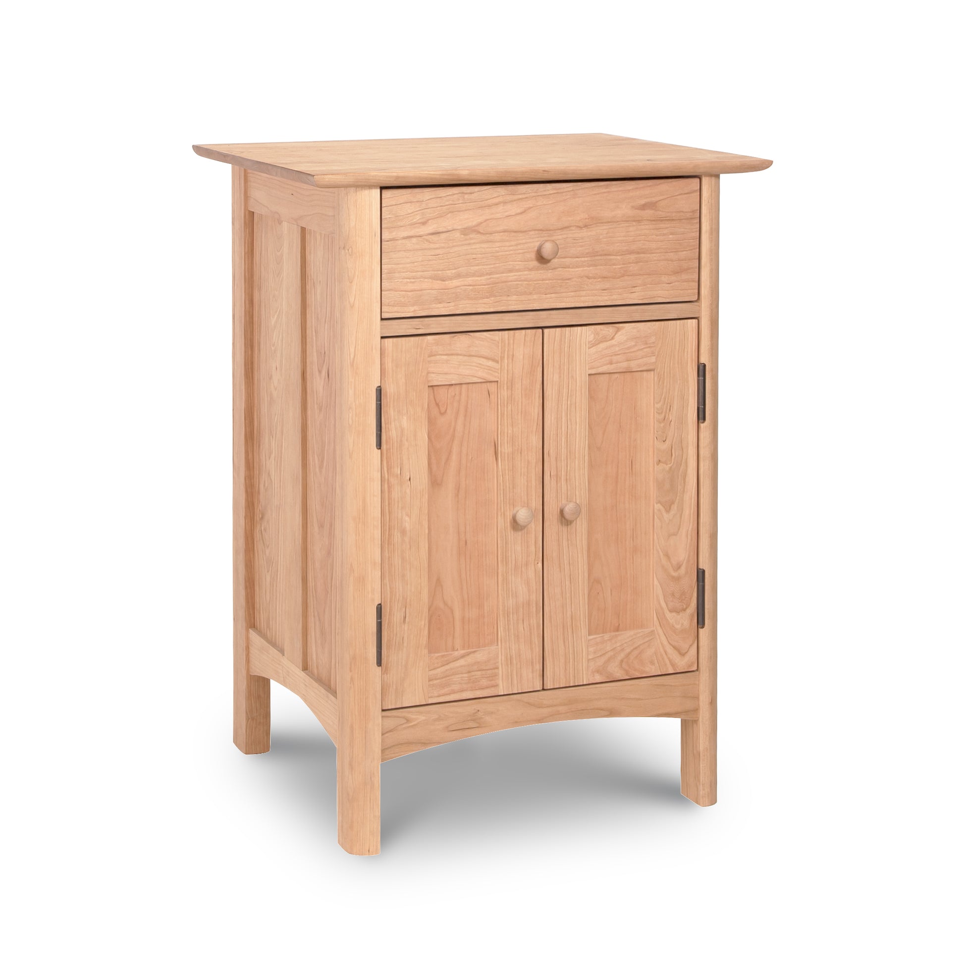 A Vermont Furniture Designs Heartwood Shaker Short Storage Chest, a luxury wooden nightstand with two drawers and a door, providing ample storage space.