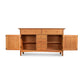 A Vermont Furniture Designs Heartwood Shaker Sideboard crafted from solid hardwoods with open doors and drawers revealing internal shelves and compartments, isolated on a white background.