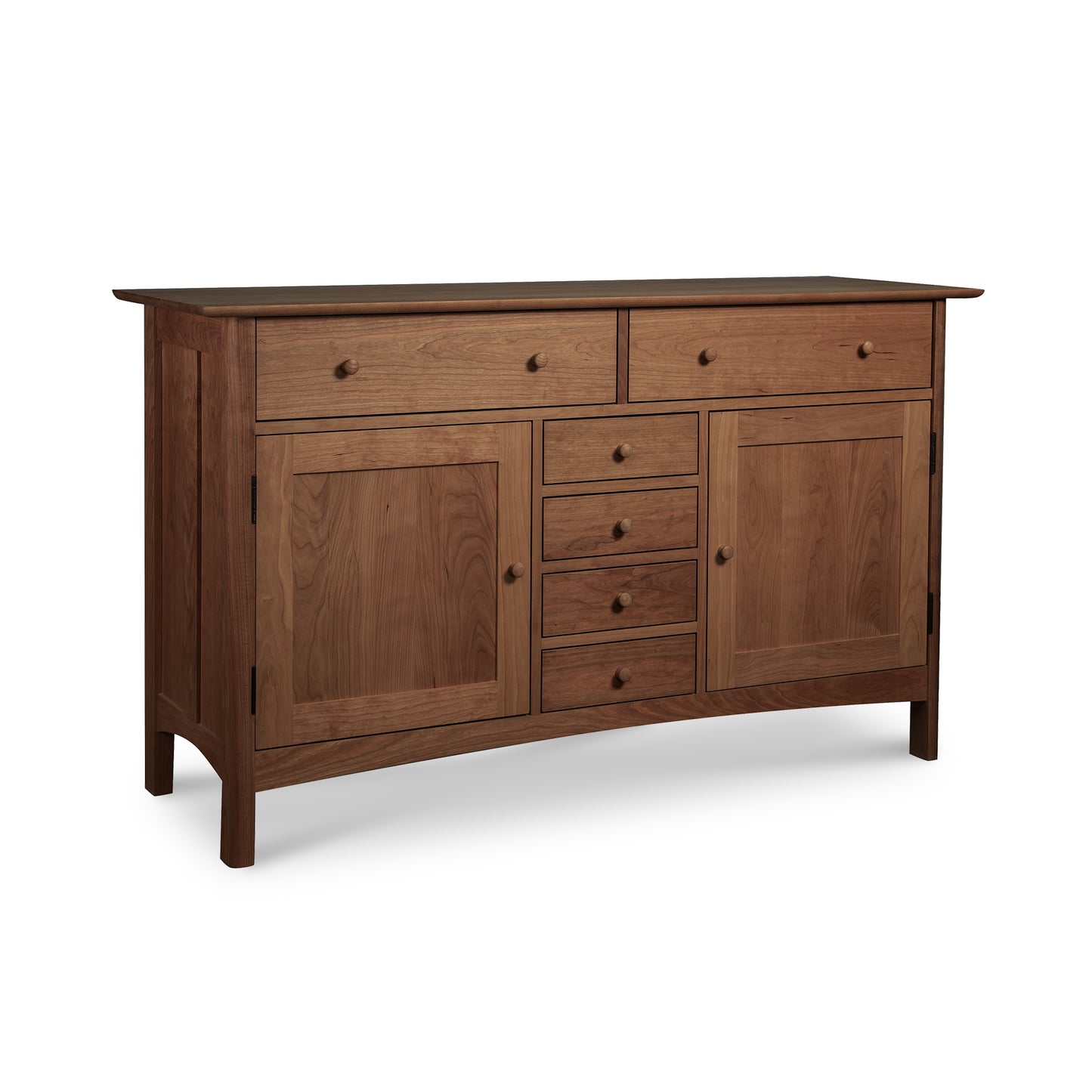 Solid hardwoods Vermont Furniture Designs Heartwood Shaker Sideboard with six drawers and two cabinet doors on a white background.