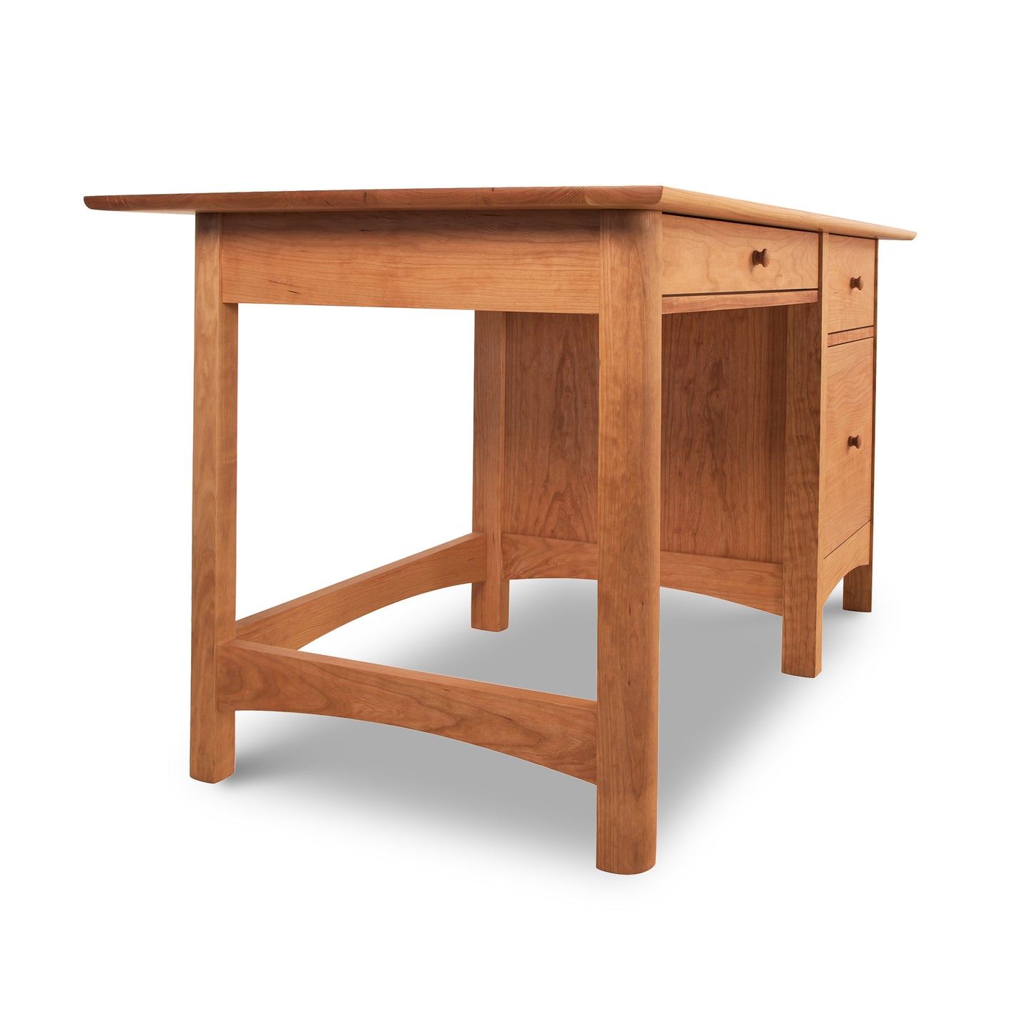 Vermont Furniture Designs Heartwood Shaker Study Desk with a single pedestal of drawers on the right side, featuring a flat top and sturdy construction, isolated on a white background.