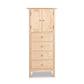 Heartwood Shaker Tall Storage Chest by Vermont Furniture Designs with two doors, four drawers, and a tall narrow silhouette in handcrafted hardwood.