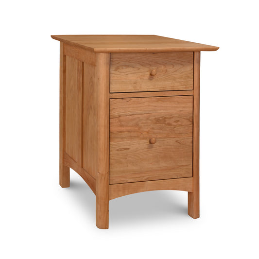 A Heartwood Shaker Vertical File Cabinet by Vermont Furniture Designs, with two drawers, featuring an eco-friendly oil finish, on a white background.
