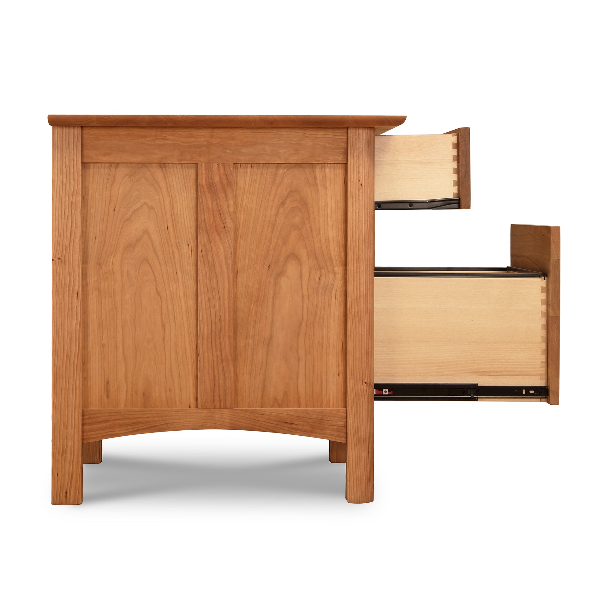 A wooden nightstand with two drawers and a Vermont Furniture Designs Heartwood Shaker Vertical File Cabinet.