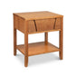 A Lyndon Furniture Holland 1-Drawer Open Shelf Nightstand with a drawer for storage.