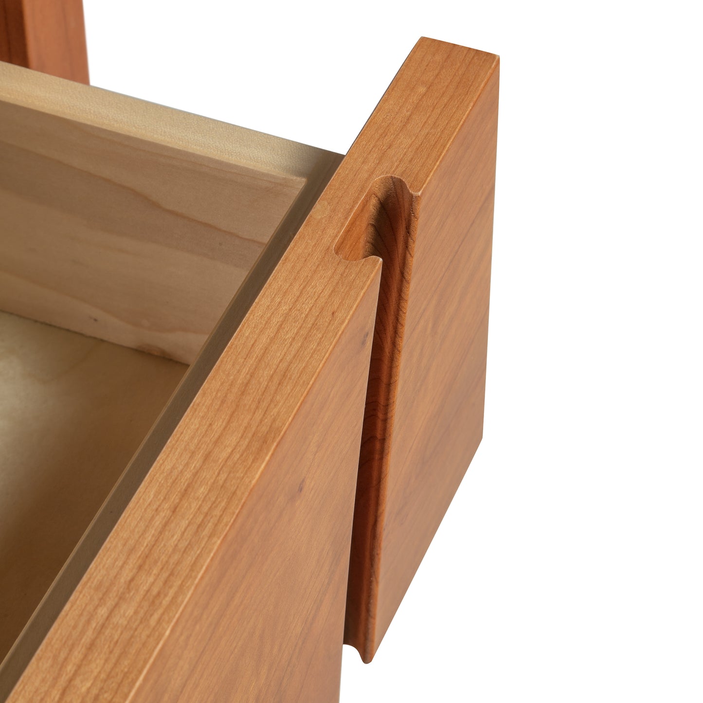 A close up view of a wooden storage drawer on a Lyndon Furniture Holland 1-Drawer Open Shelf Nightstand.
