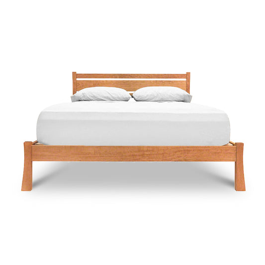 Horizon Platform Bed – Queen by Vermont Furniture Designs shown with headboard, white mattress, and two pillows. American made solid wood bed.