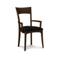 A solid American cherry wood Ingrid Chair with a black upholstered seat by Copeland Furniture on a white background.