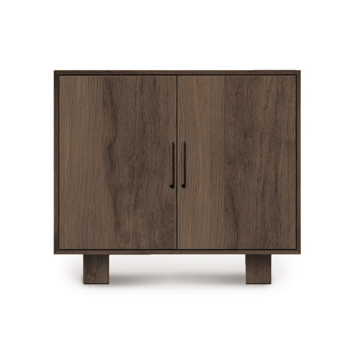 A Iso 2-Door Buffet dining storage cabinet, crafted from solid oak hardwood by Copeland Furniture, stands upright against a plain white background.