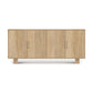 Copeland Furniture's Iso Oak 4-Door Buffet, a mid-century modern piece crafted from solid hardwood oak, with short legs, isolated on a white background.