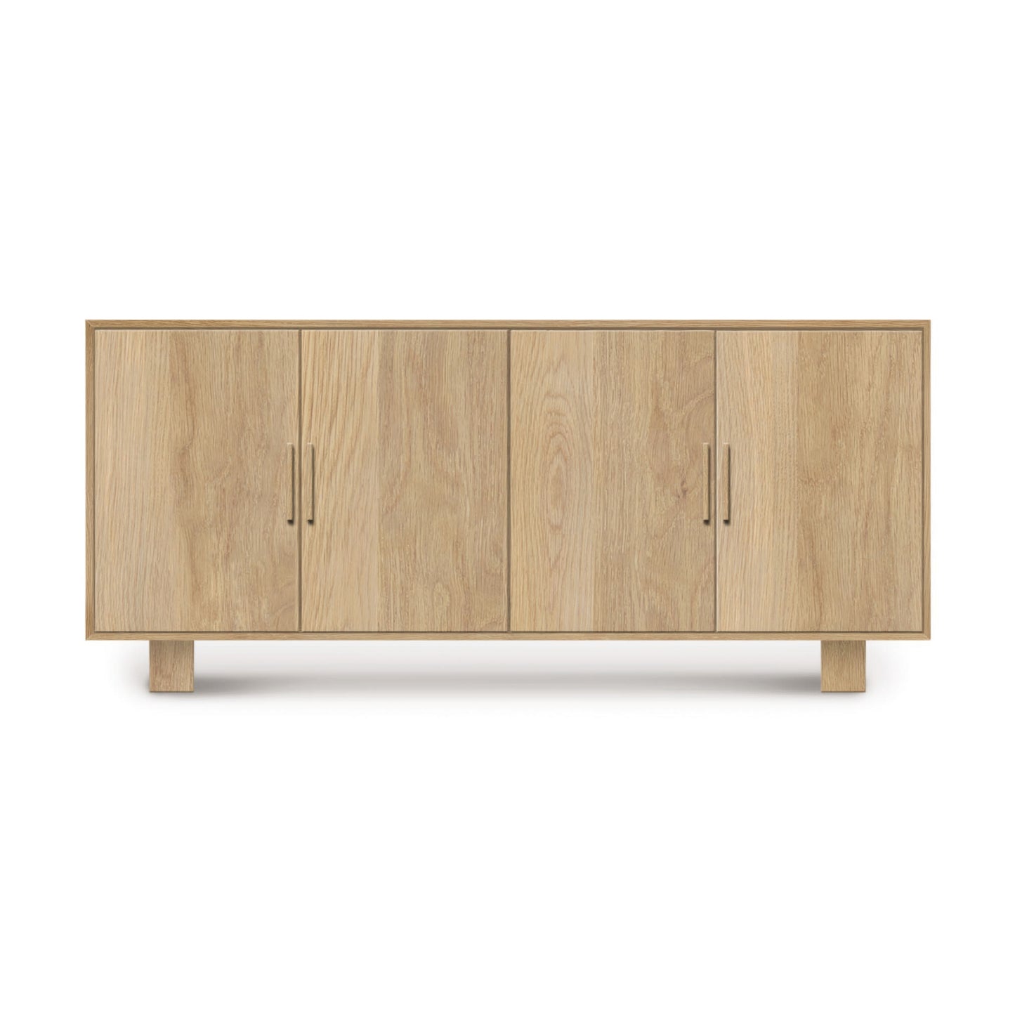Copeland Furniture's Iso Oak 4-Door Buffet, a mid-century modern piece crafted from solid hardwood oak, with short legs, isolated on a white background.