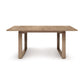 This Iso Extension dining table from Copeland Furniture features a wooden base, creating a timeless and elegant piece.