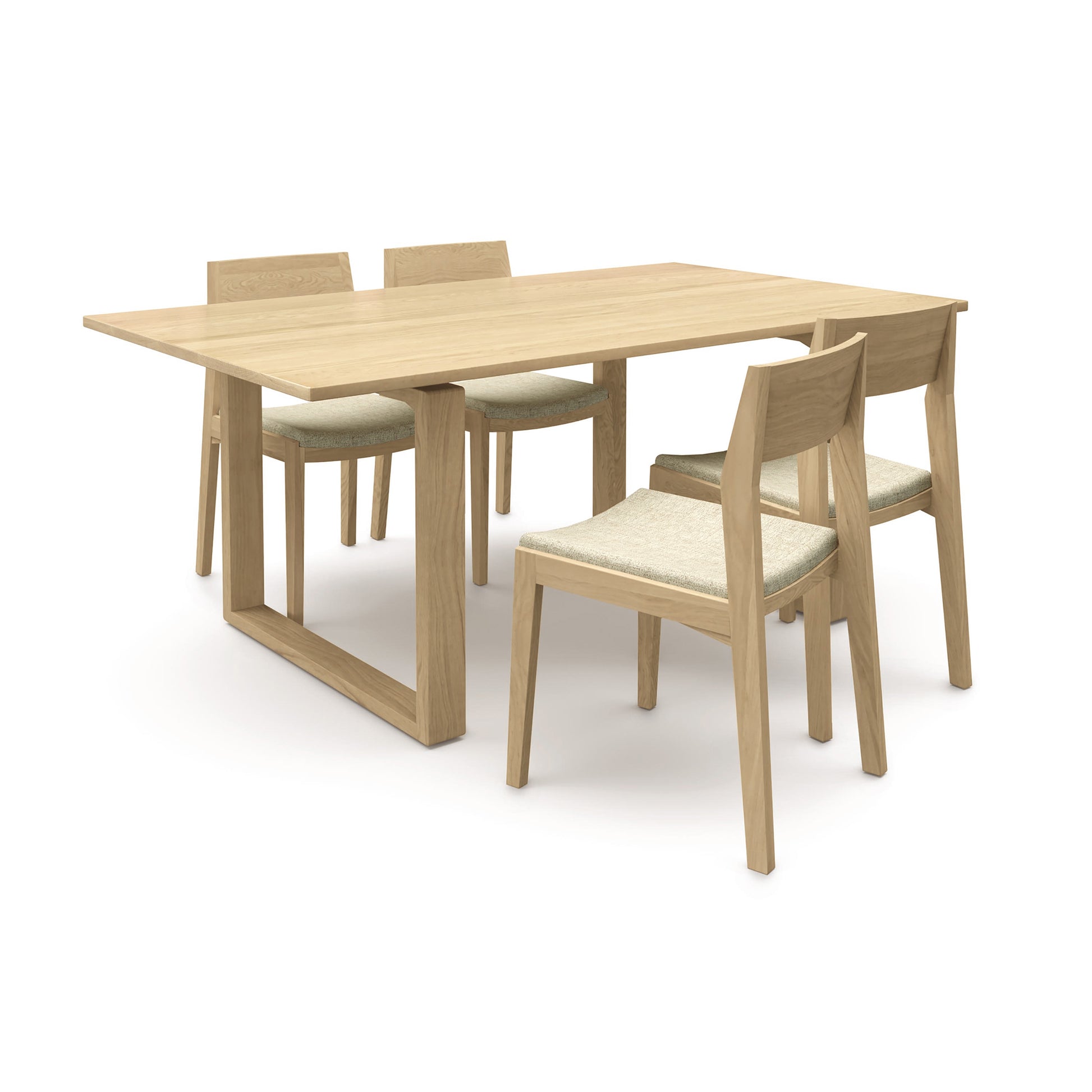 A sustainably sourced Iso Solid Top Dining Table with four matching chairs set on a white background by Copeland Furniture.