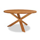 Junction Solid Top Table by Lyndon Furniture featuring a sleek round surface and three distinctive angled legs, crafted from solid wood.