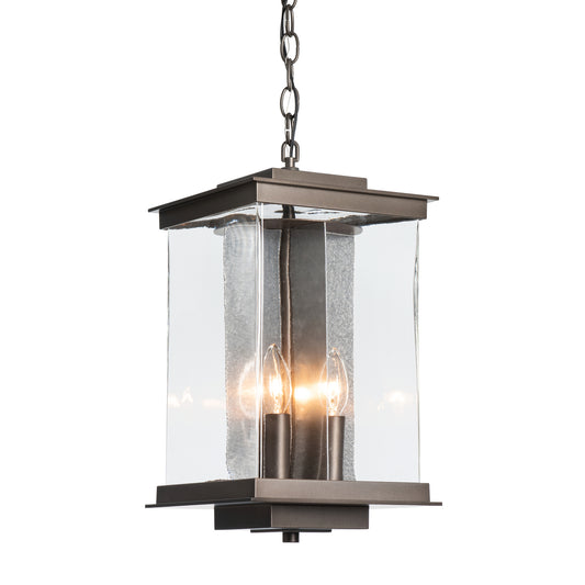 Kingston Outdoor Large Lantern by Hubbardton Forge with glass panels and metal chain, showcasing elegant American craftsmanship and refined design.