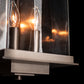 Hubbardton Forge Kingston Outdoor Large Lantern featuring two candle bulbs and clear glass panels, showcasing its elegant craftsmanship.