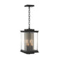 Kingston Outdoor Large Lantern by Hubbardton Forge with black square frame, clear glass panels, and two candle-style bulbs suspended inside.