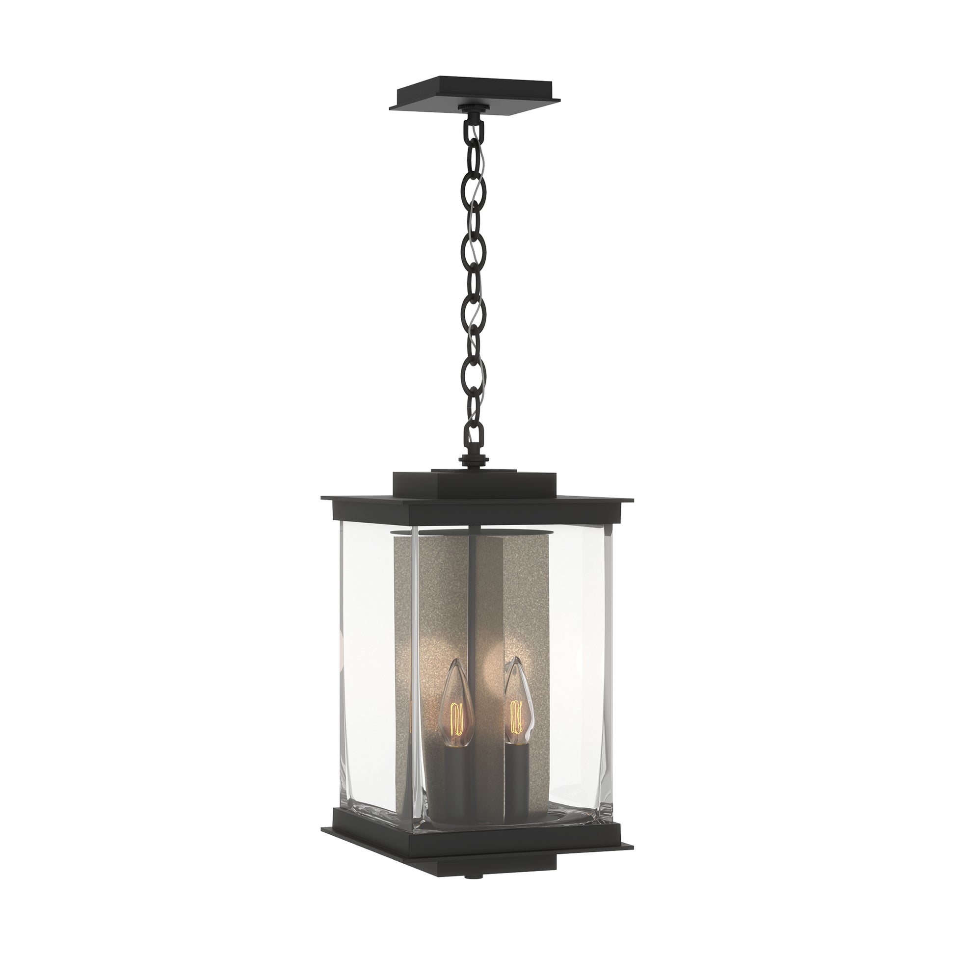 Kingston Outdoor Large Lantern by Hubbardton Forge with black square frame, clear glass panels, and two candle-style bulbs suspended inside.