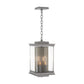 Kingston Outdoor Large Lantern by Hubbardton Forge with clear glass panels and two candle-style bulbs, suspended from a chain.