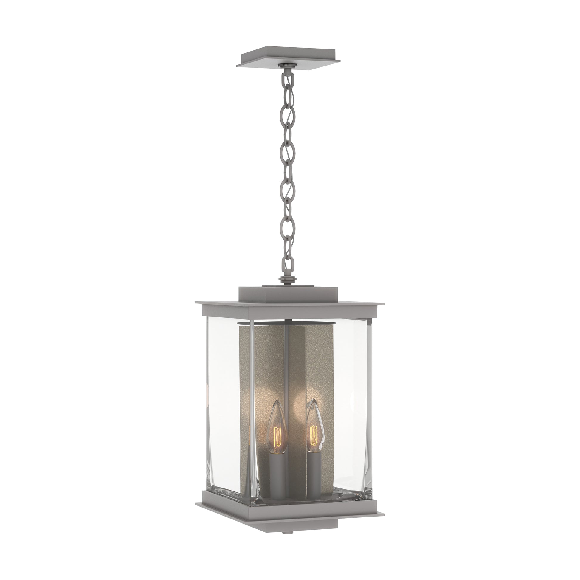 Kingston Outdoor Large Lantern by Hubbardton Forge with clear glass panels and two candle-style bulbs, suspended from a chain.