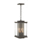 Kingston Outdoor Large Lantern by Hubbardton Forge featuring a Coastal Bronze frame, clear glass panels, and candle-style bulbs.