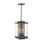 Hubbardton Forge Kingston Outdoor Large Lantern showcasing elegant candle-style bulbs and classic metalwork, ideal for enhancing outdoor furniture settings.