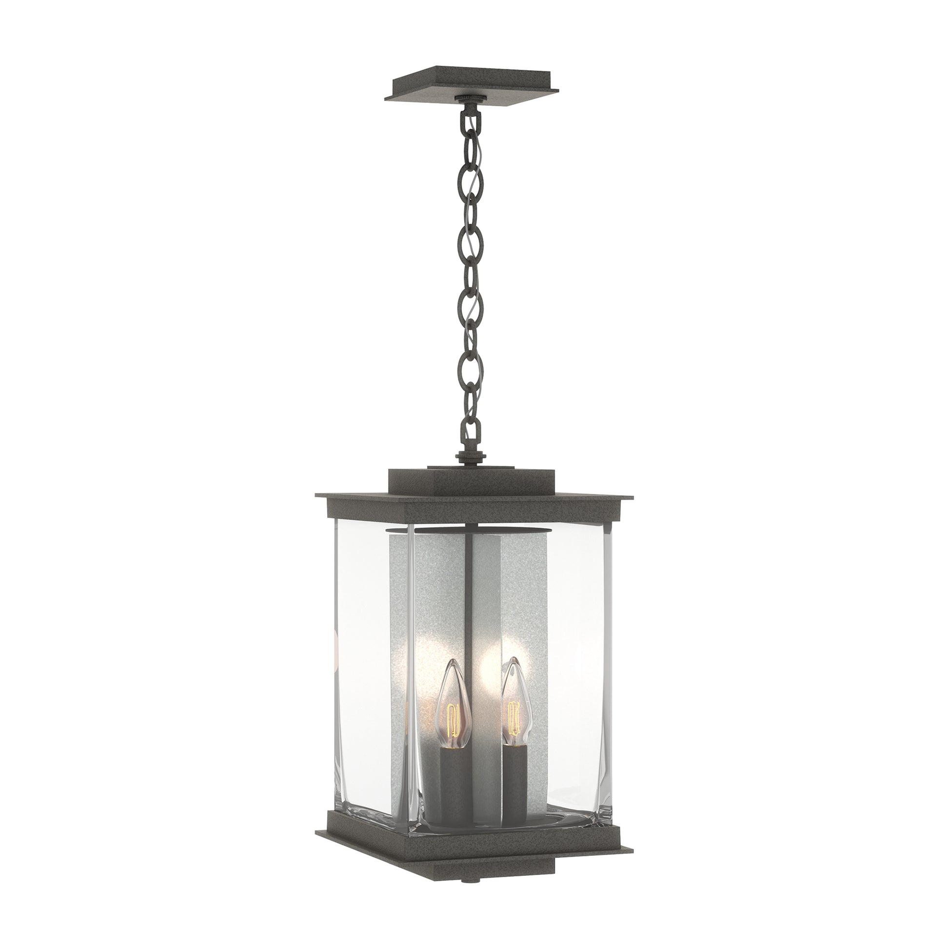 Hubbardton Forge Kingston Outdoor Large Lantern featuring black metal, glass, and three candle-style bulbs suspended on a chain.
