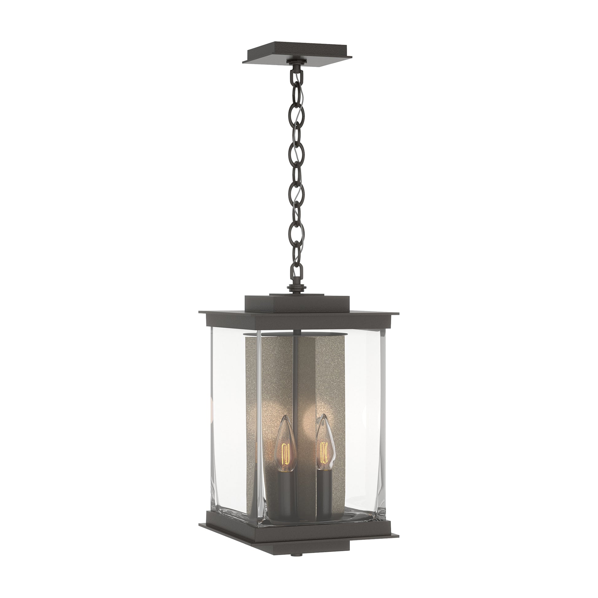 Kingston Outdoor Large Lantern by Hubbardton Forge with black metal and glass frame, showcasing two candle-style bulbs.